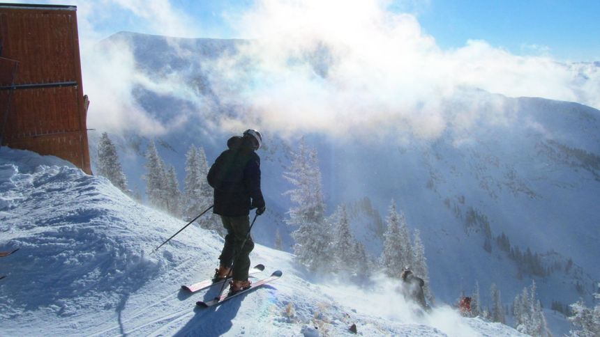 skier shred the mountain at snowbird