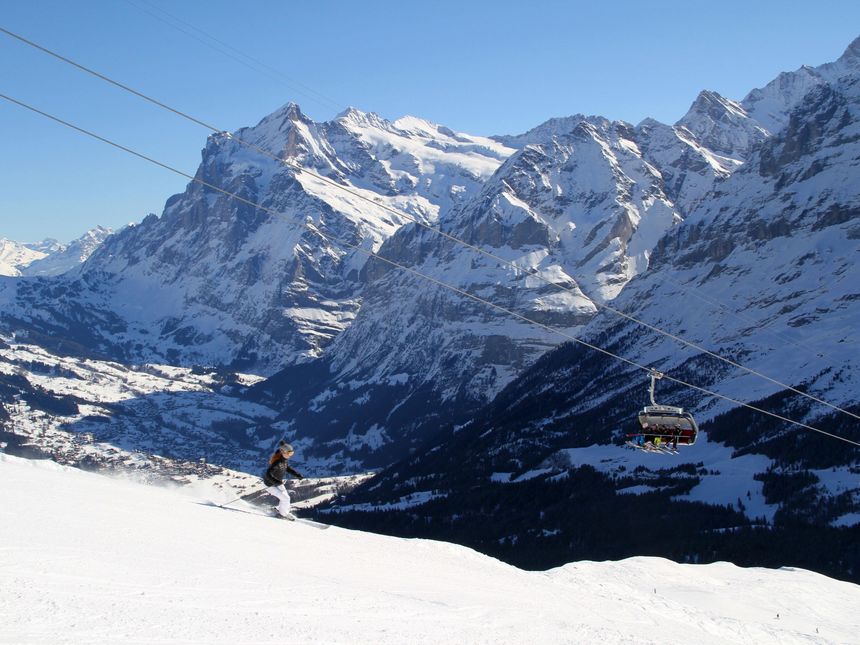 Skiing beneath Lauberhorn chairlift